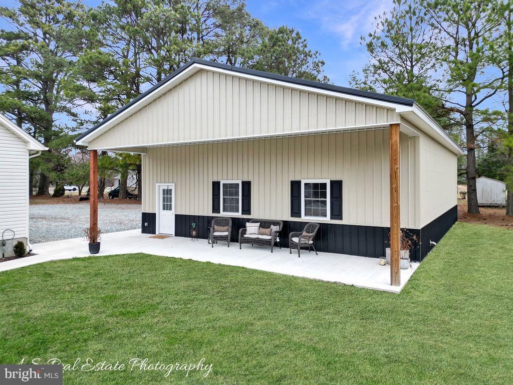 30019 Mt Vernon Road Princess Anne, MD 21853 - Photo 2 of 28 a front view of house with yard and seating area