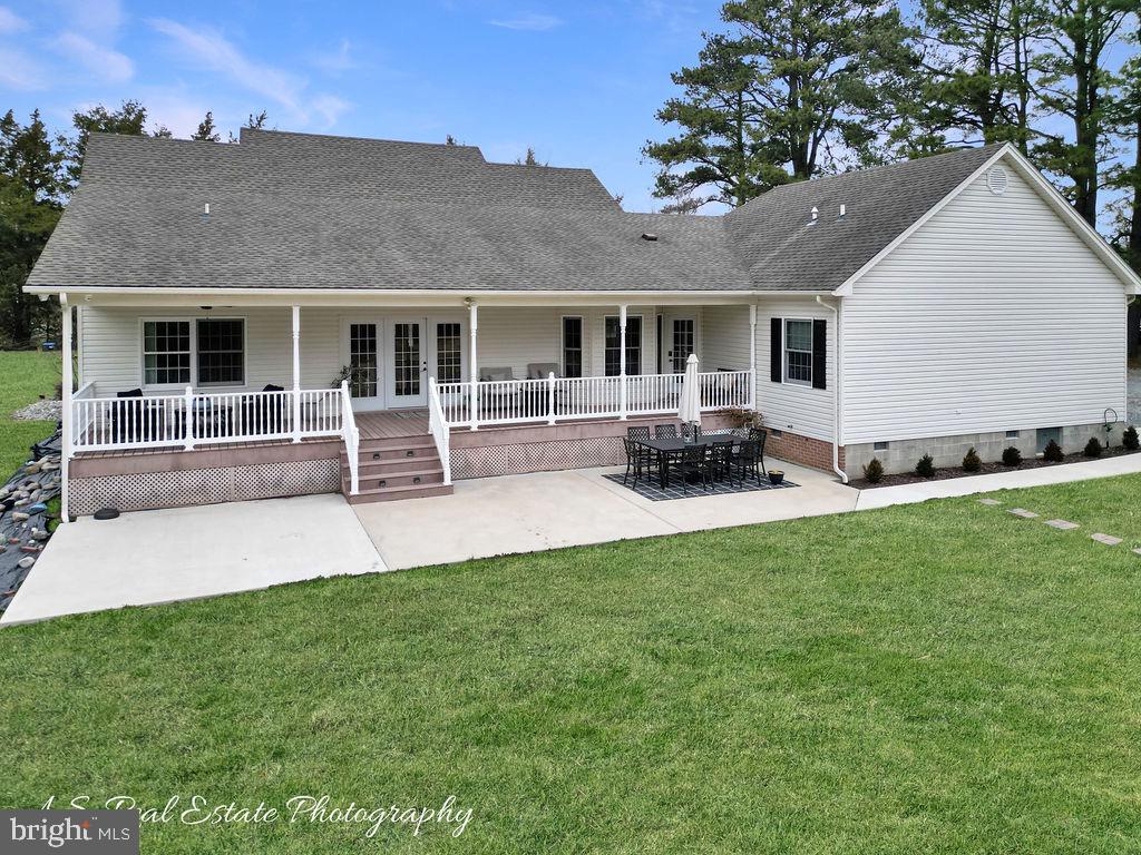 30019 Mt Vernon Road Princess Anne, MD 21853 - Photo 4 of 28 a front view of house with yard and outdoor seating