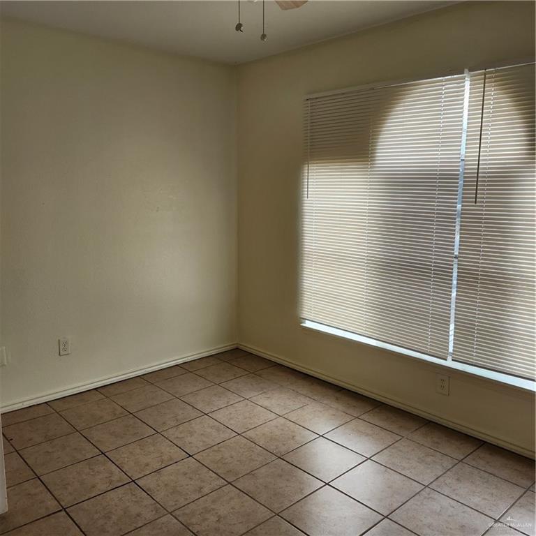417 North 28th Street, Unit 3 McAllen, TX 78501 - Photo 6 of 7 a view of an empty room with a window