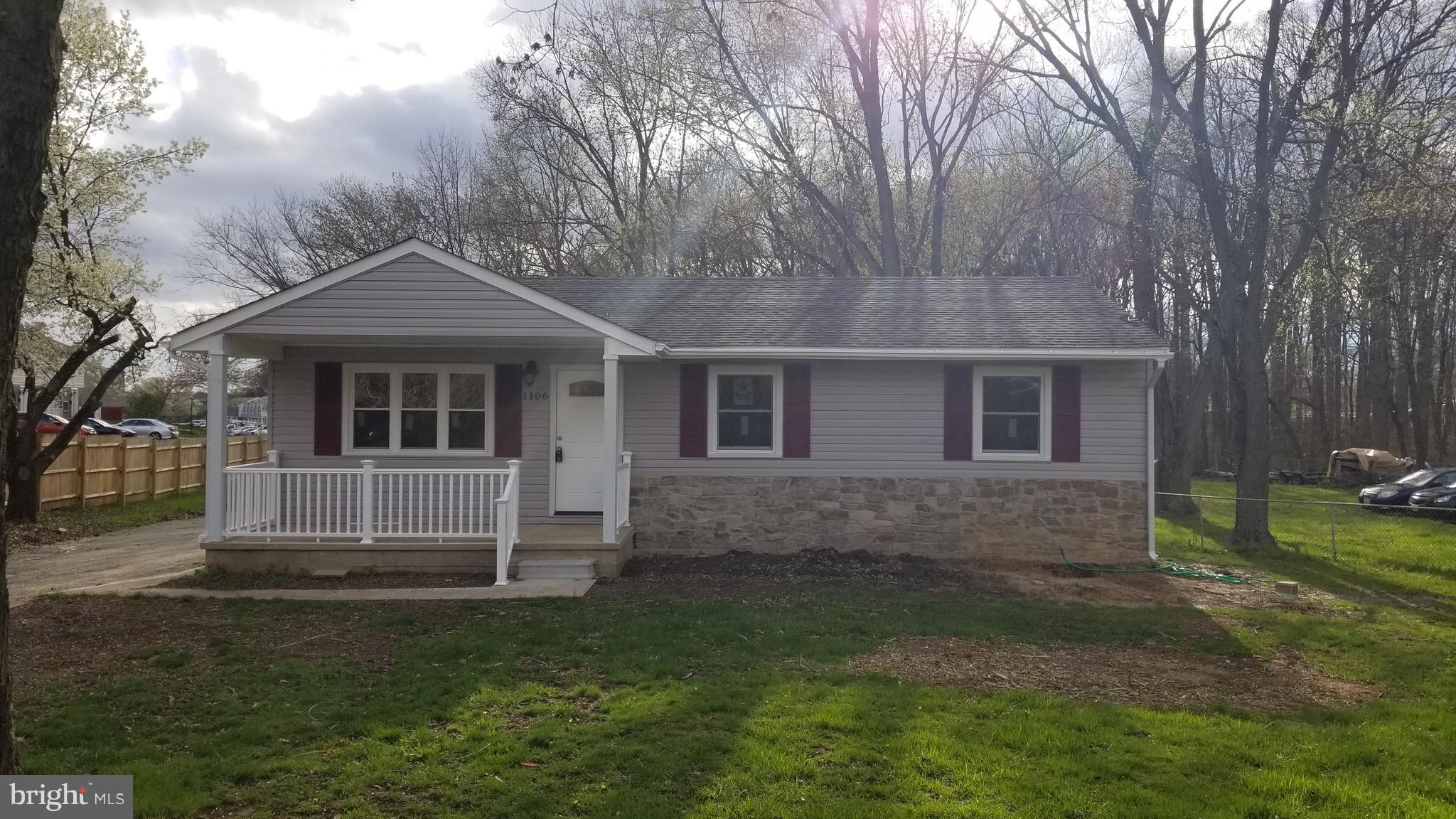 1106 Wampler Road Middle River, MD 21220 - Photo 1 of 27 a front view of a house with garden
