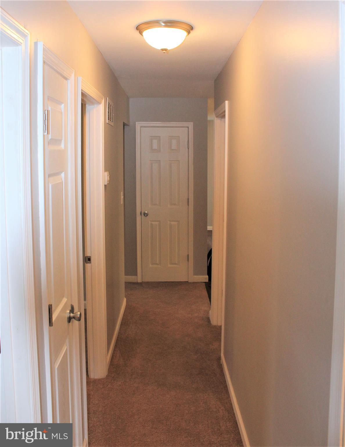 1106 Wampler Road Middle River, MD 21220 - Photo 13 of 27 a view of a hallway with closet and bathroom