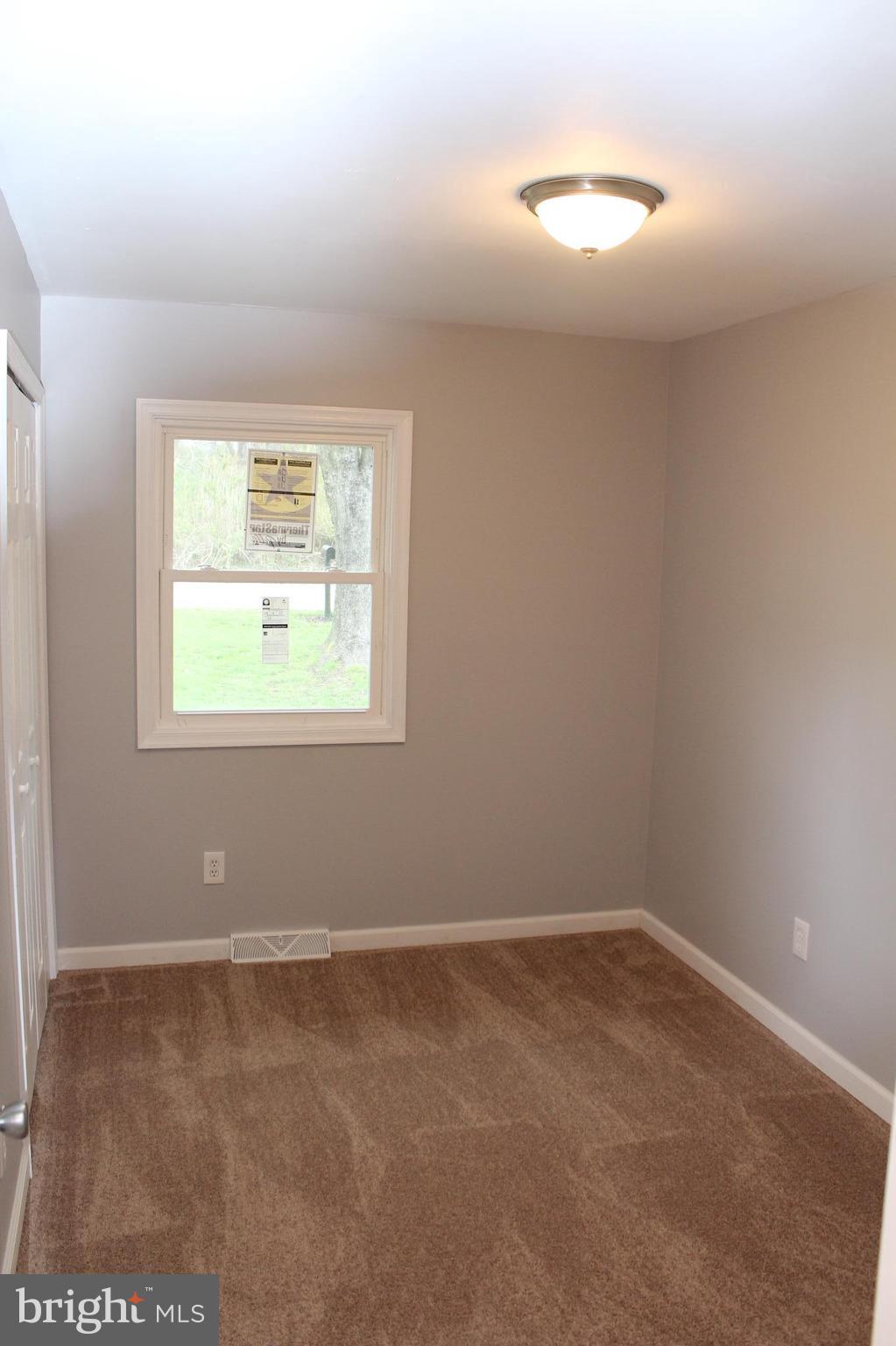 1106 Wampler Road Middle River, MD 21220 - Photo 15 of 27 an empty room with a window