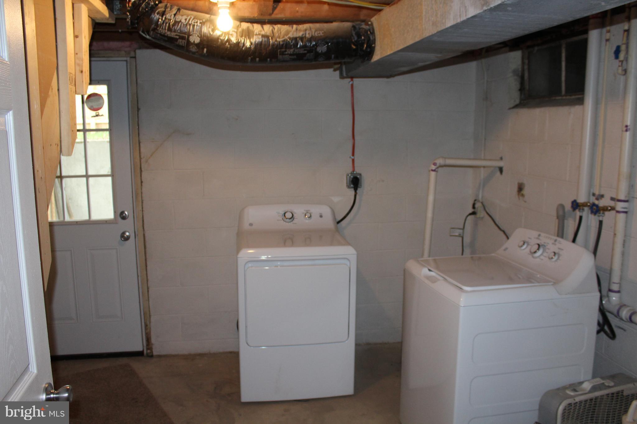 1106 Wampler Road Middle River, MD 21220 - Photo 25 of 27 a utility room with dryer and washer