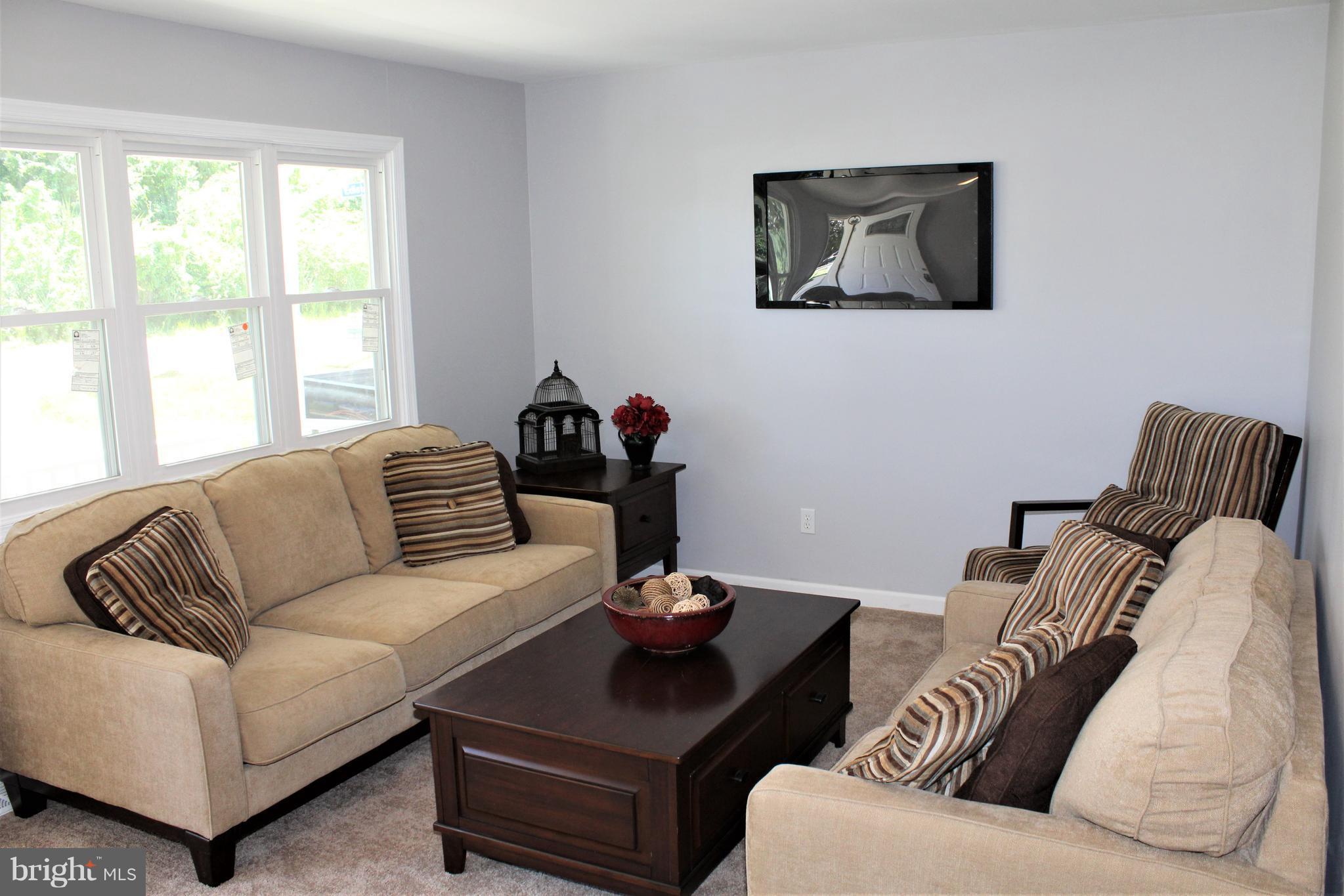 1106 Wampler Road Middle River, MD 21220 - Photo 5 of 27 a living room with furniture and a large window