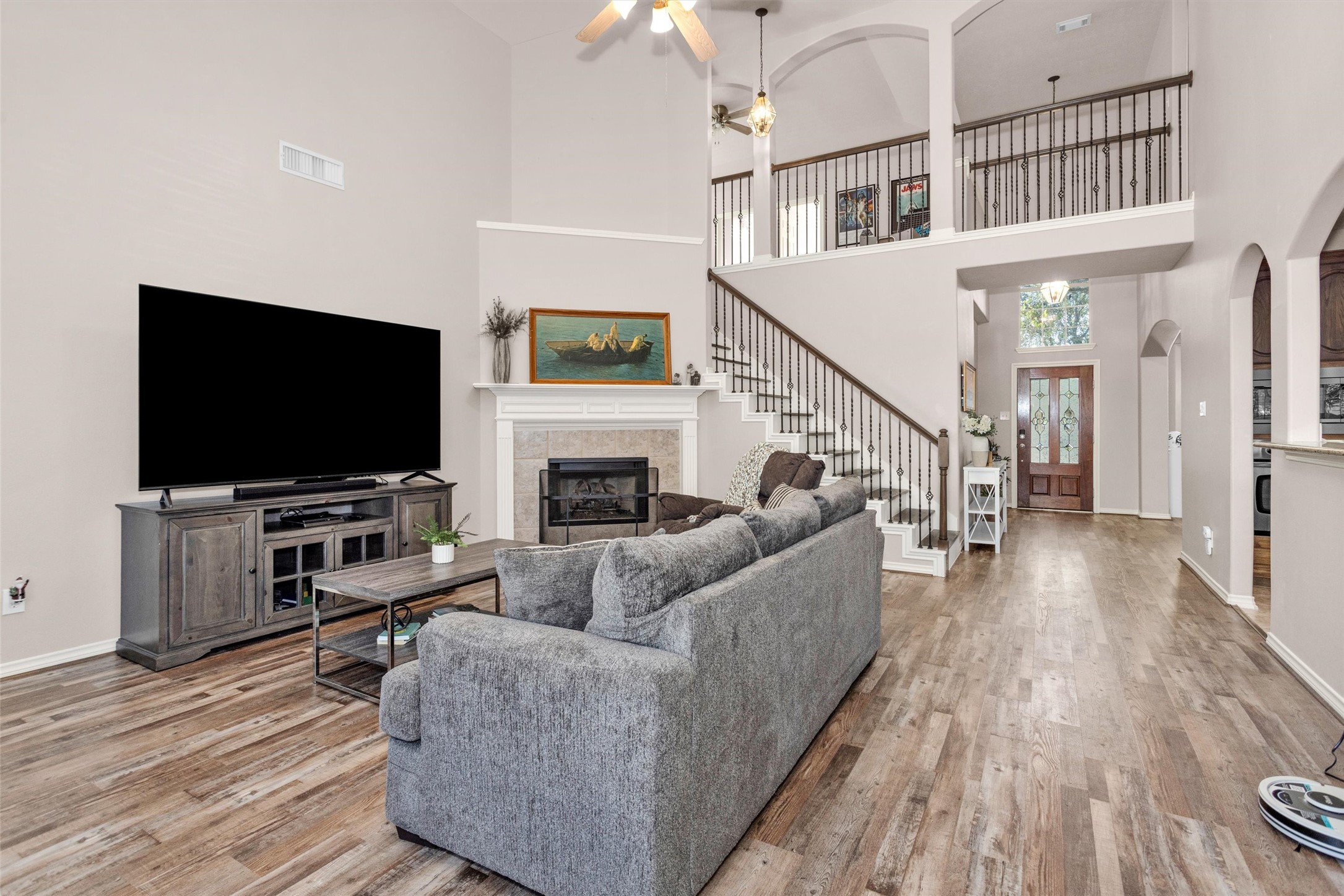 30110 Legends Ridge Drive Spring, TX 77386 - Photo 16 of 49 a living room with furniture and a flat screen tv