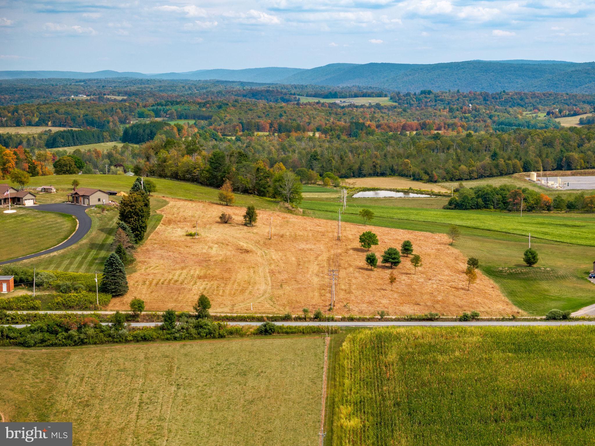 89 Drifty Lane Trout Run, PA 17771 - Photo 7 of 19 a view of a city with an ocean