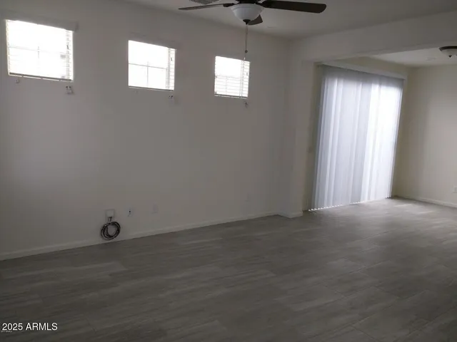 an empty room that has a window