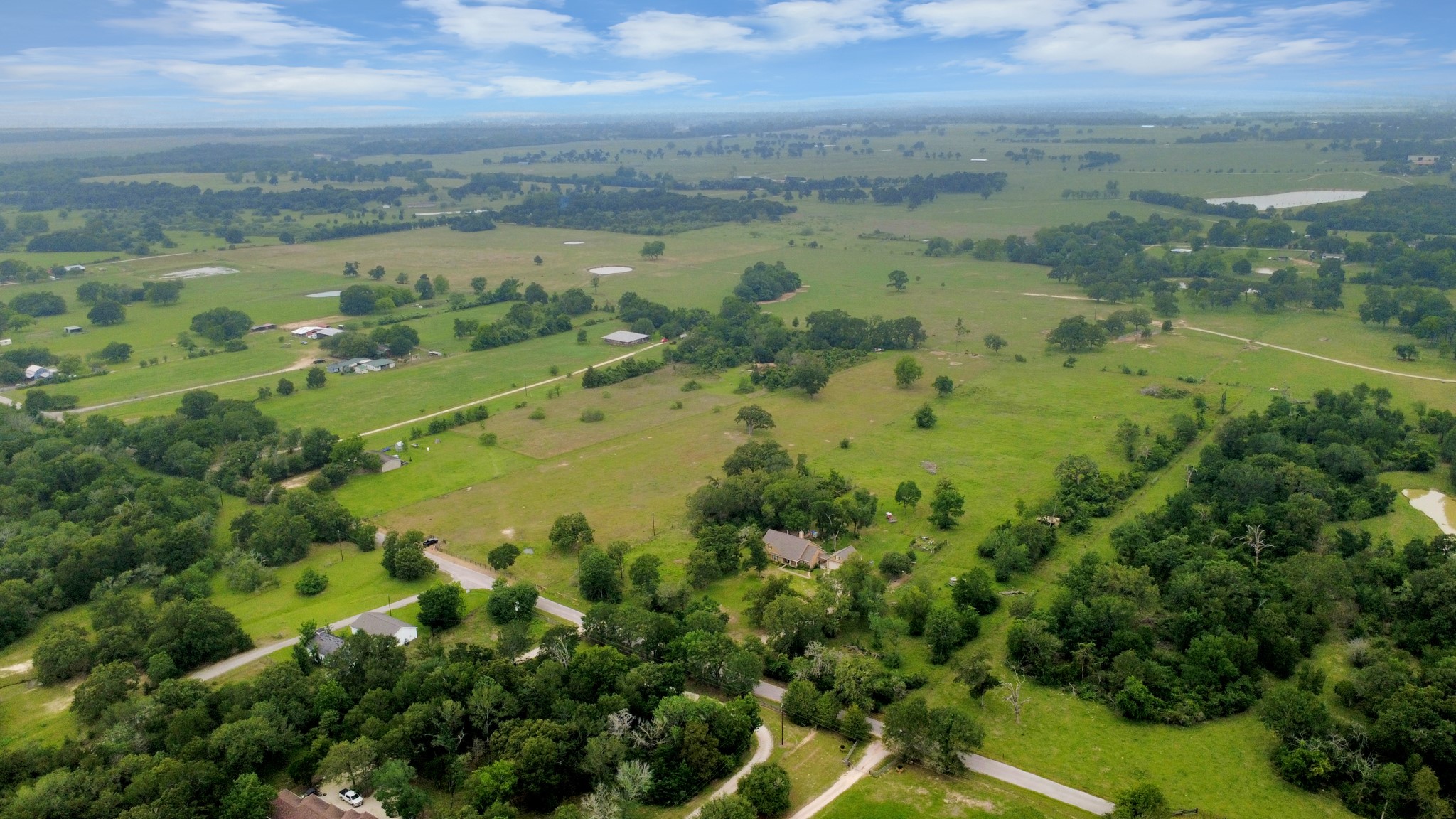 47130 Qualls Road Hempstead, TX 77445 - Photo 10 of 10 a view of a lake with a city