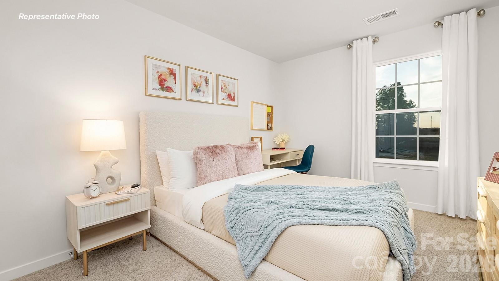 566 North Sparkleberry Street Chester, SC 29706 - Photo 22 of 28 a bedroom with a bed and a window