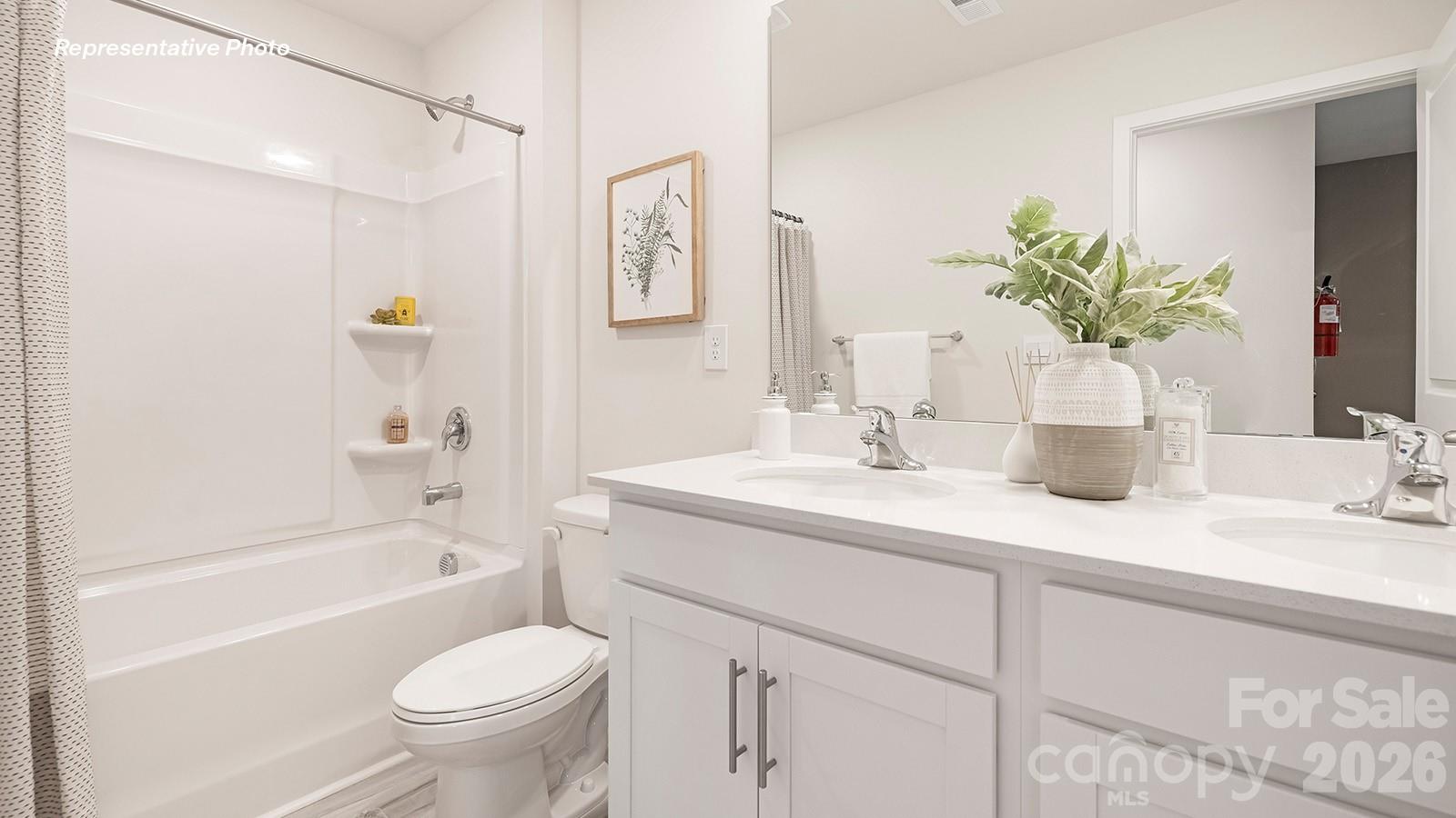 566 North Sparkleberry Street Chester, SC 29706 - Photo 23 of 28 a bathroom with a sink a toilet and shower
