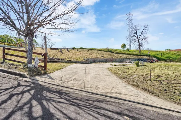 a view of a yard with an outdoor space