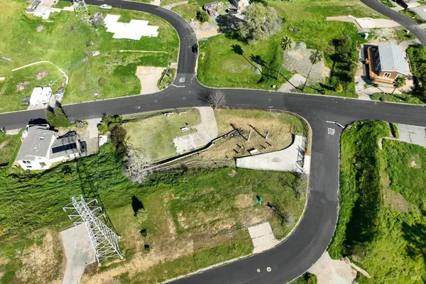 an aerial view of a swimming pool