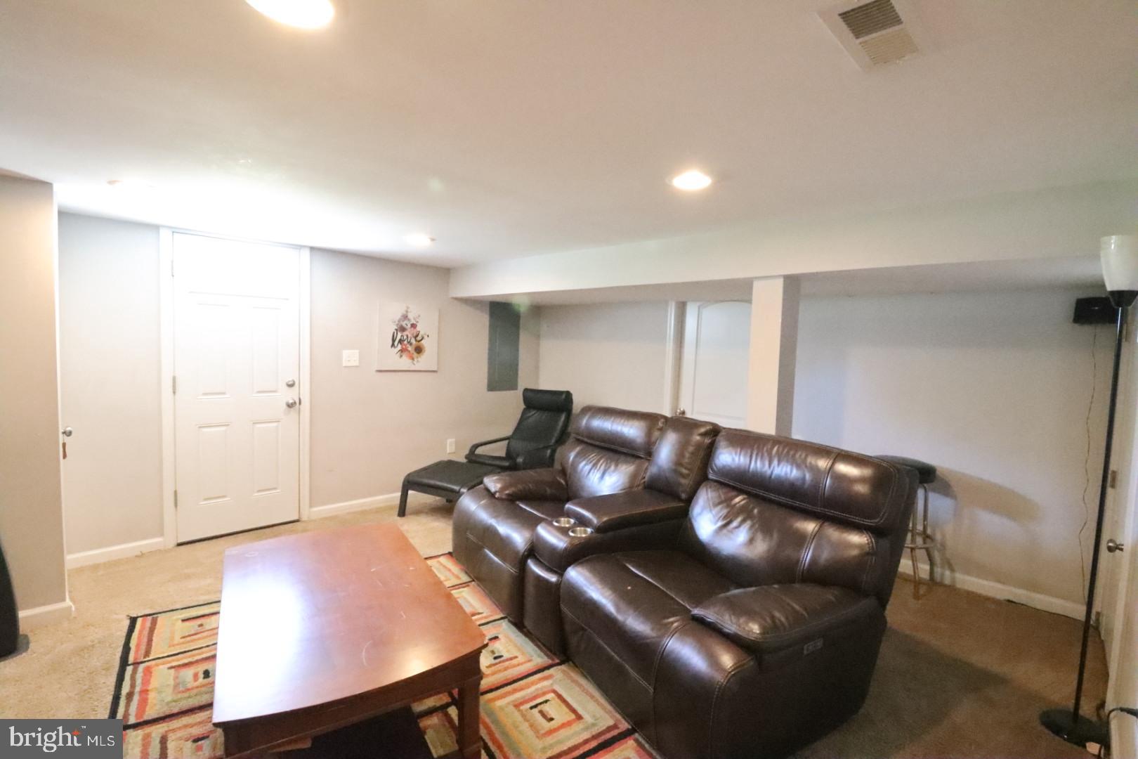 718 Cliffedge Road Pikesville, MD 21208 - Photo 23 of 28 a living room with furniture