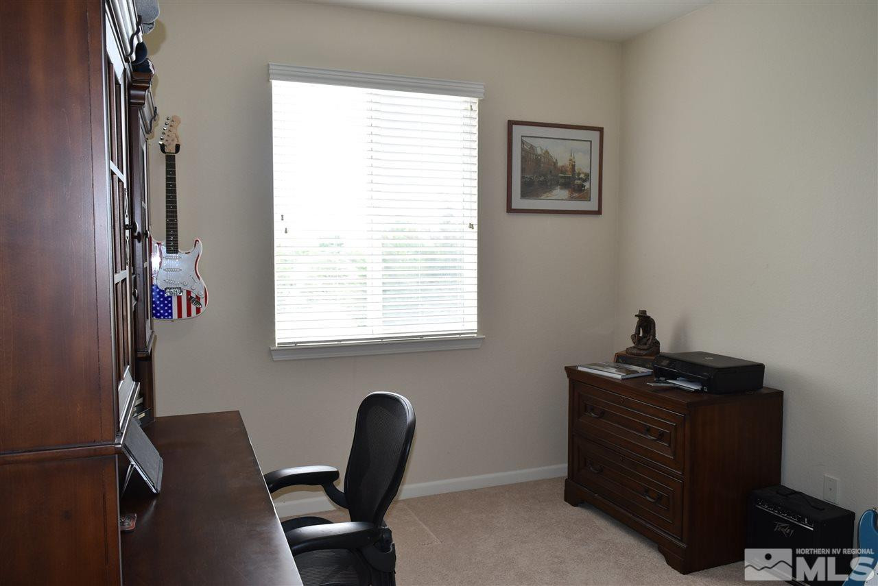 10675 Cedar Bend Court Reno, NV 89521 - Photo 16 of 22 a view of a workspace with a window