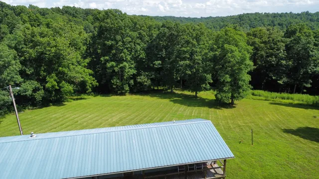 a view of a wooden deck and a yard