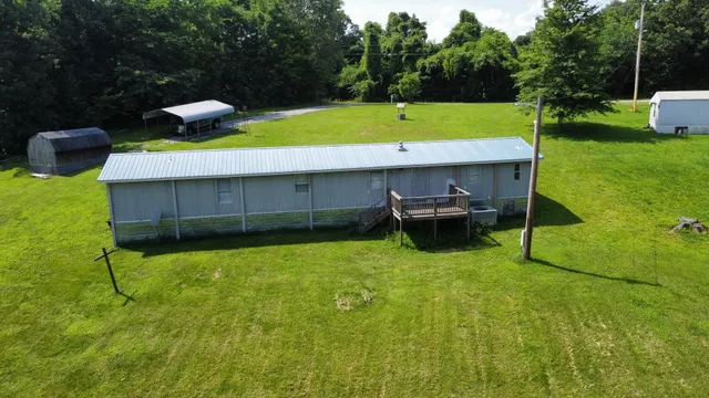 a view of a back yard with a chair