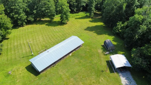 a view of a yard with furniture