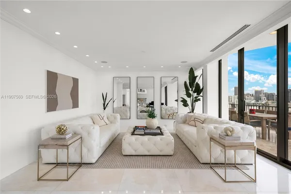 a living room with furniture and a couch