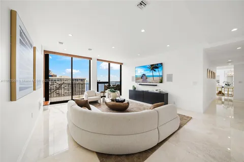a living room with furniture and a couch