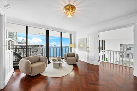 a view of balcony with furniture