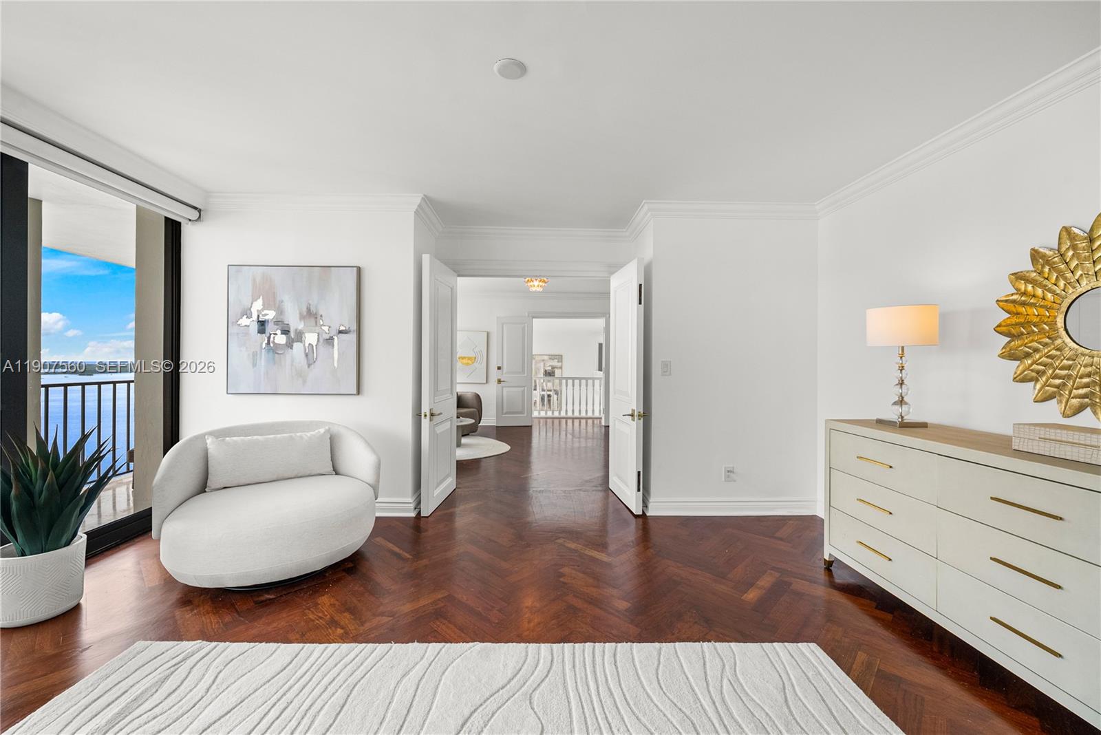 1925 Brickell Avenue, Unit DPH3 Miami, FL 33129 - Photo 29 of 56 a living room with furniture and a wooden floor