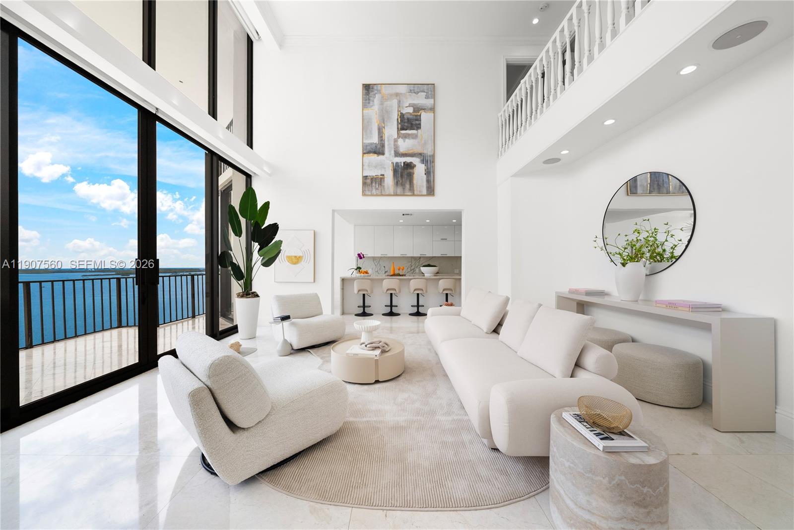 1925 Brickell Avenue, Unit DPH3 Miami, FL 33129 - Photo 5 of 56 a living room with furniture and a large window