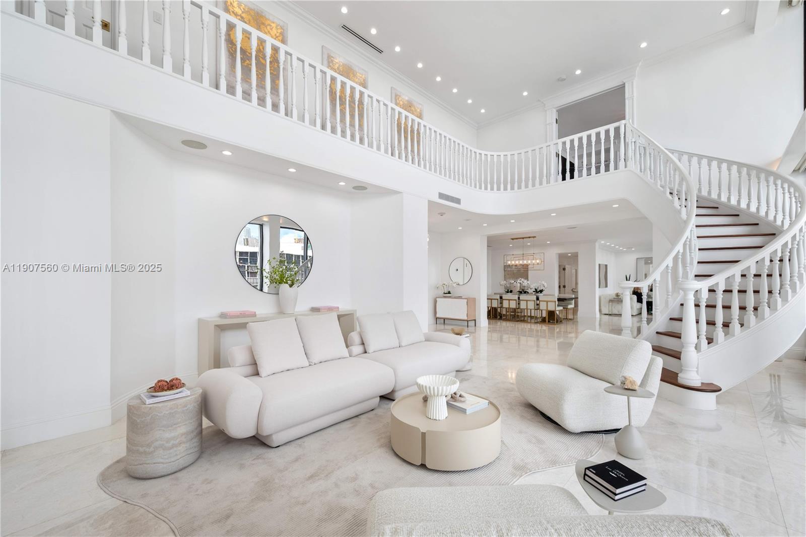 1925 Brickell Avenue, Unit DPH3 Miami, FL 33129 - Photo 6 of 56 a living room with furniture and a wooden floor