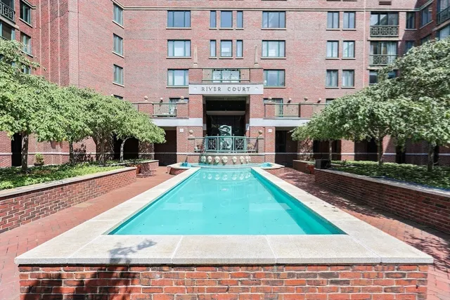 a view of a building with a yard