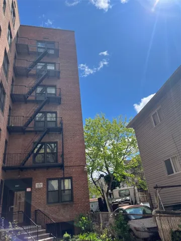 a kitchen with granite countertop a stove and a microwave