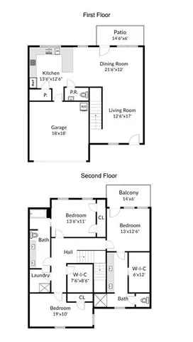 an aerial view of residential houses with outdoor space and parking