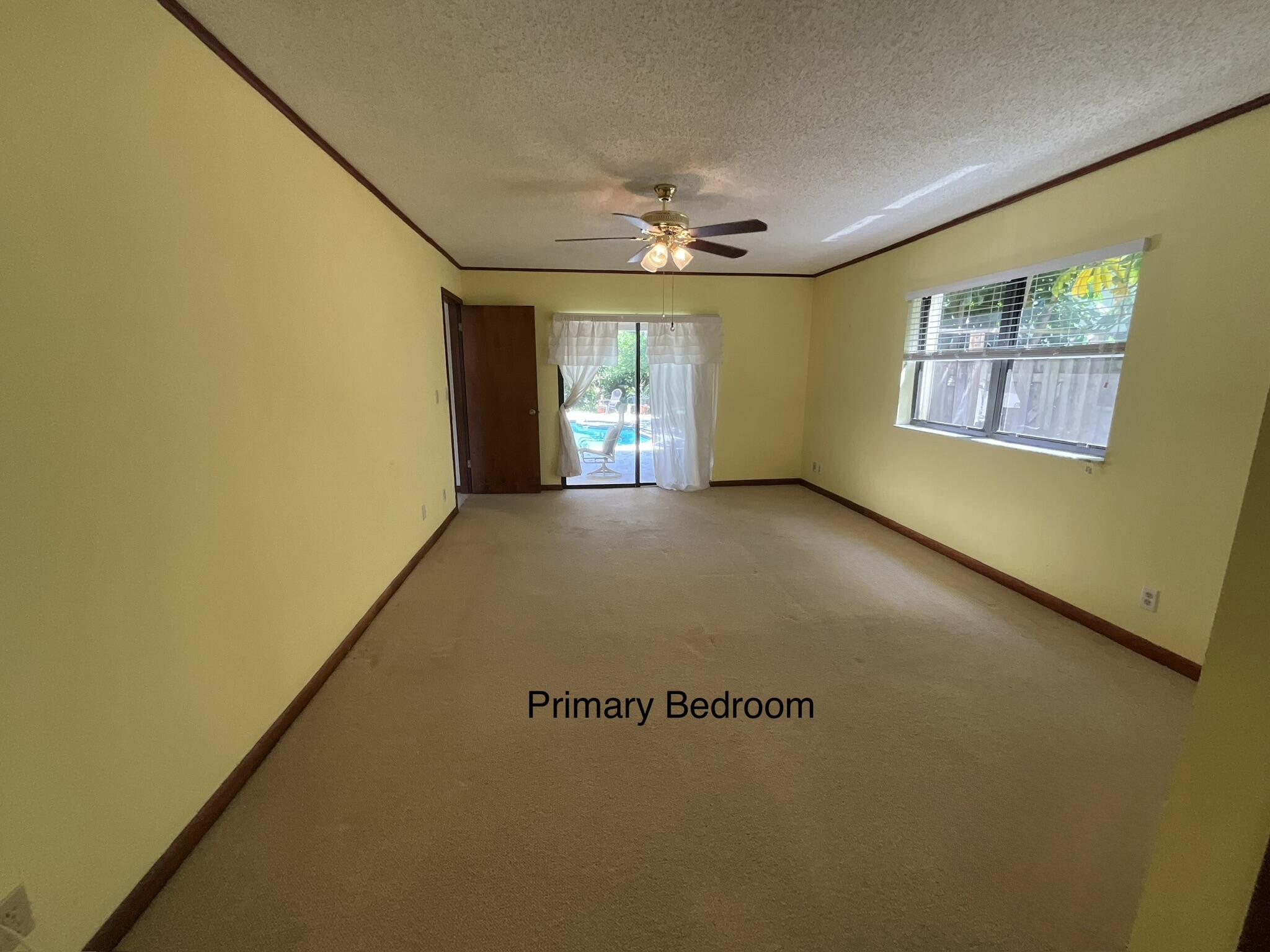 6114 Woodbury Road Boca Raton, FL 33433 - Photo 9 of 30 Primary Bedroom