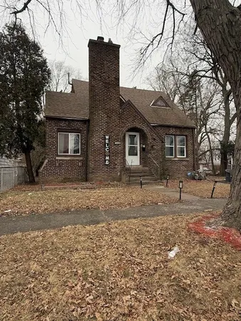 a view of a brick house with a window