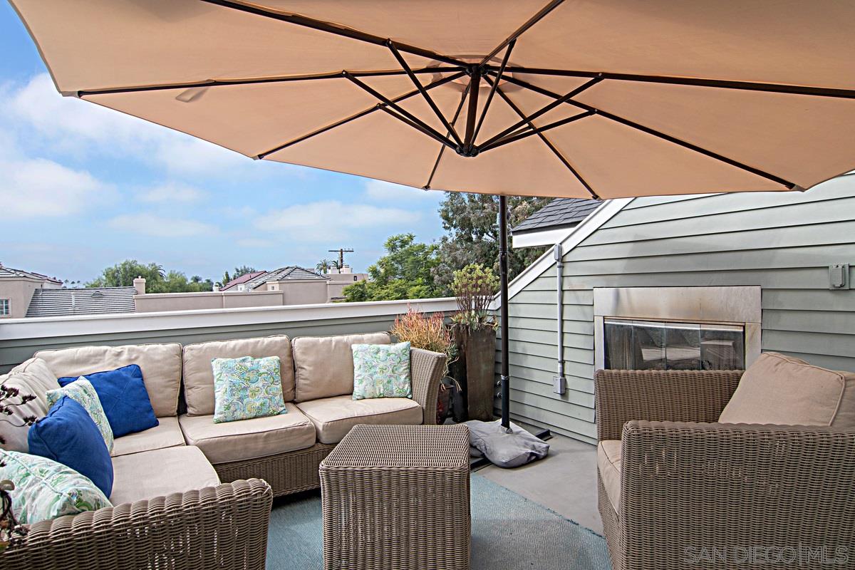 a balcony with furniture