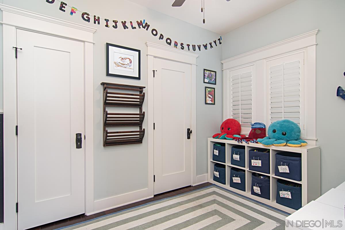 918 D Avenue Coronado, CA 92118 - Photo 13 of 41 a view of a hallway with entryway and chandelier