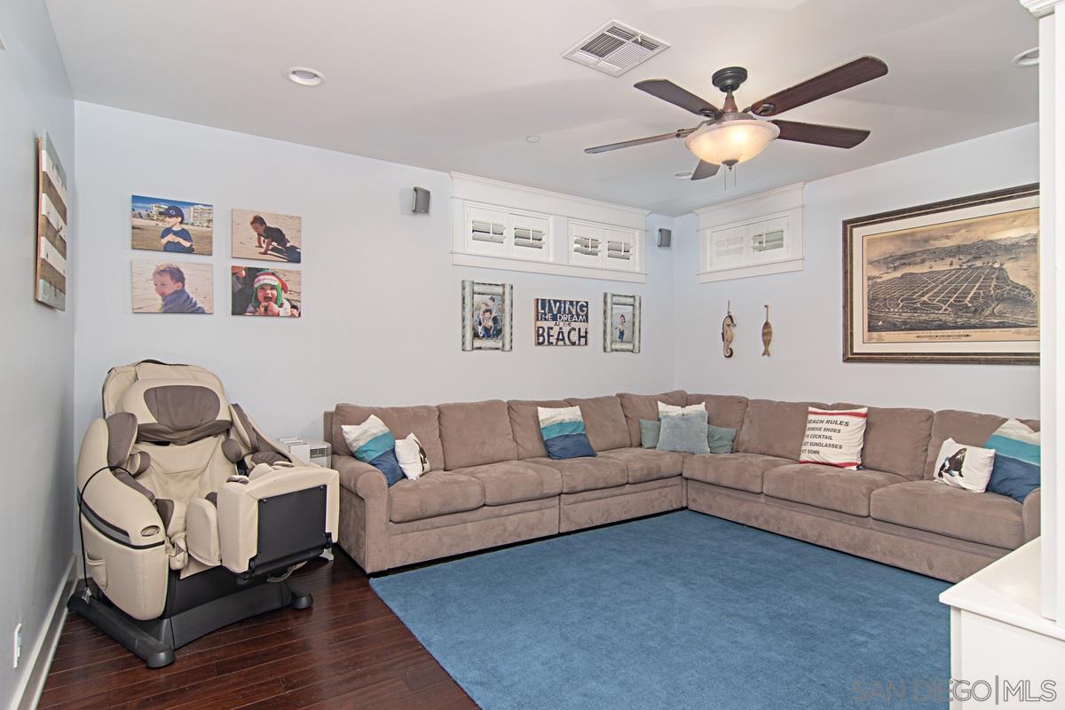 918 D Avenue Coronado, CA 92118 - Photo 15 of 41 a living room with furniture and a wooden floor