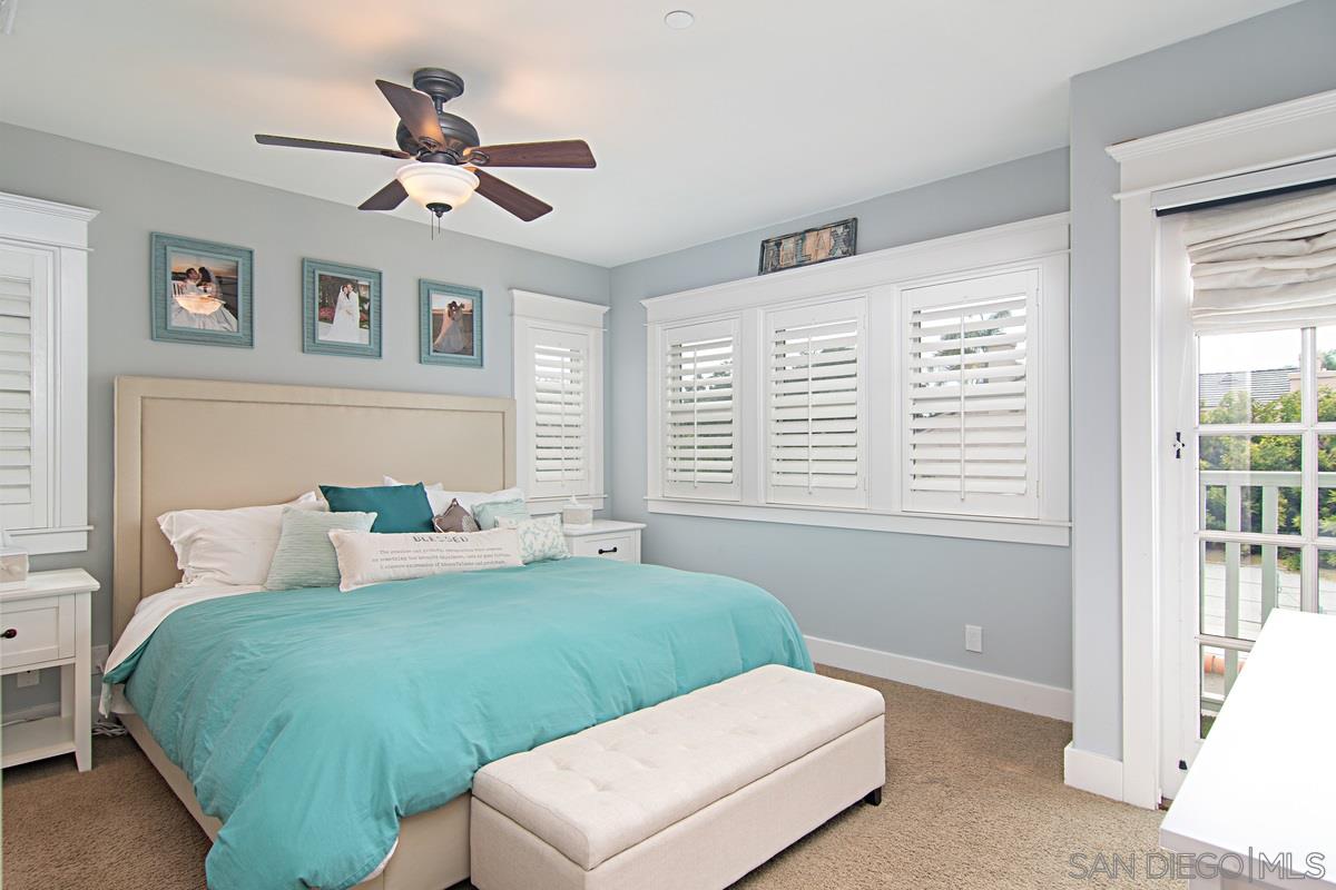 918 D Avenue Coronado, CA 92118 - Photo 21 of 41 a bedroom with a bed and a window