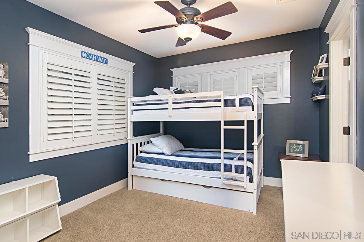 918 D Avenue Coronado, CA 92118 - Photo 26 of 41 a bedroom with furniture and window