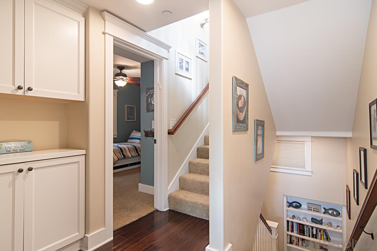 918 D Avenue Coronado, CA 92118 - Photo 29 of 41 a view of entryway with furniture and wooden floor