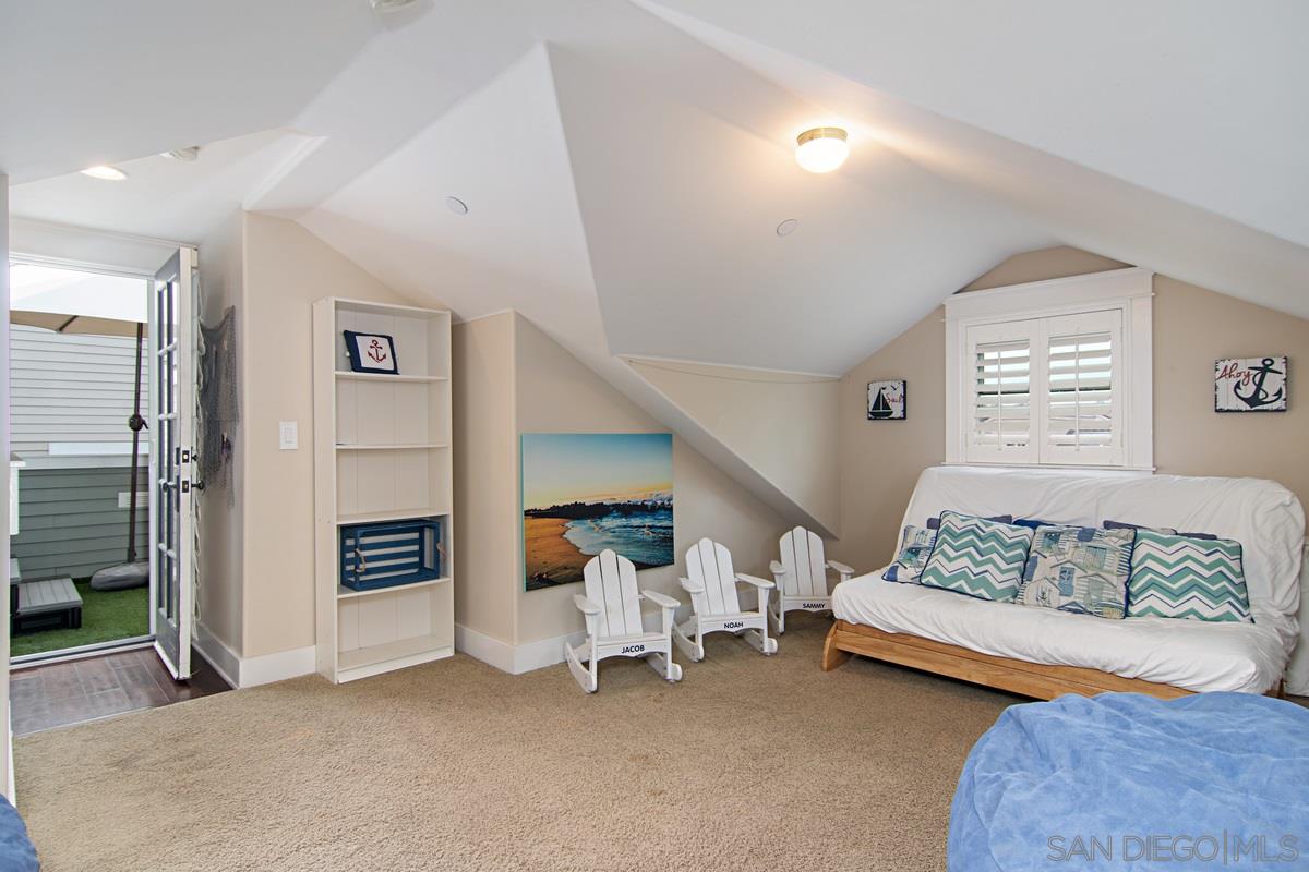 918 D Avenue Coronado, CA 92118 - Photo 31 of 41 a bedroom with furniture and a couch