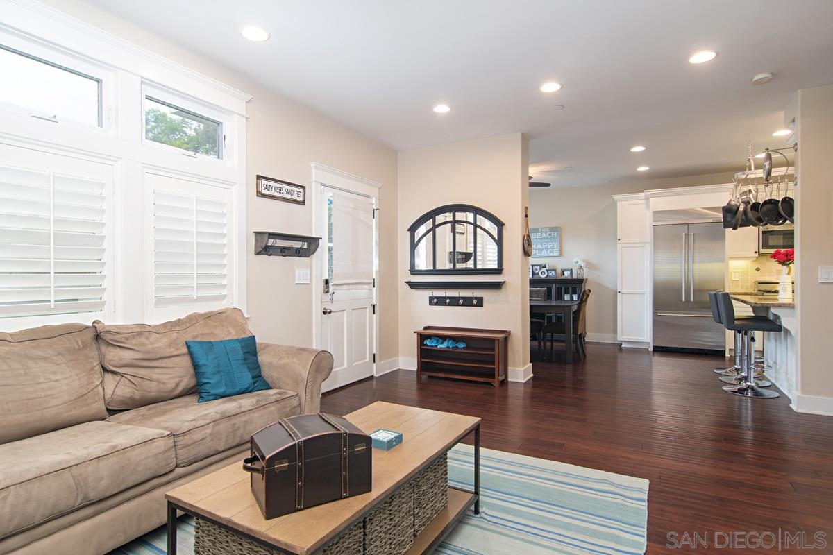 918 D Avenue Coronado, CA 92118 - Photo 7 of 41 a living room with furniture and a fireplace