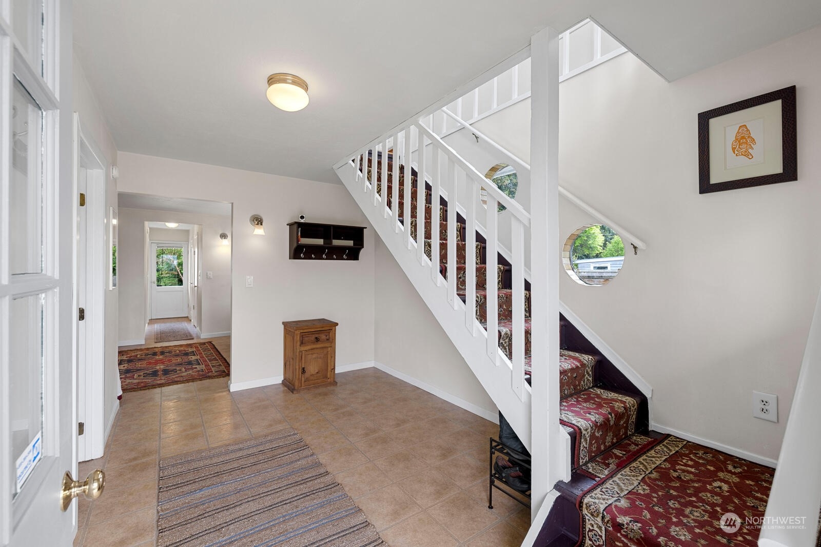 7524 Maxwelton Road Clinton, WA 98236 - Photo 18 of 30 a view of entryway and hall with wooden floor
