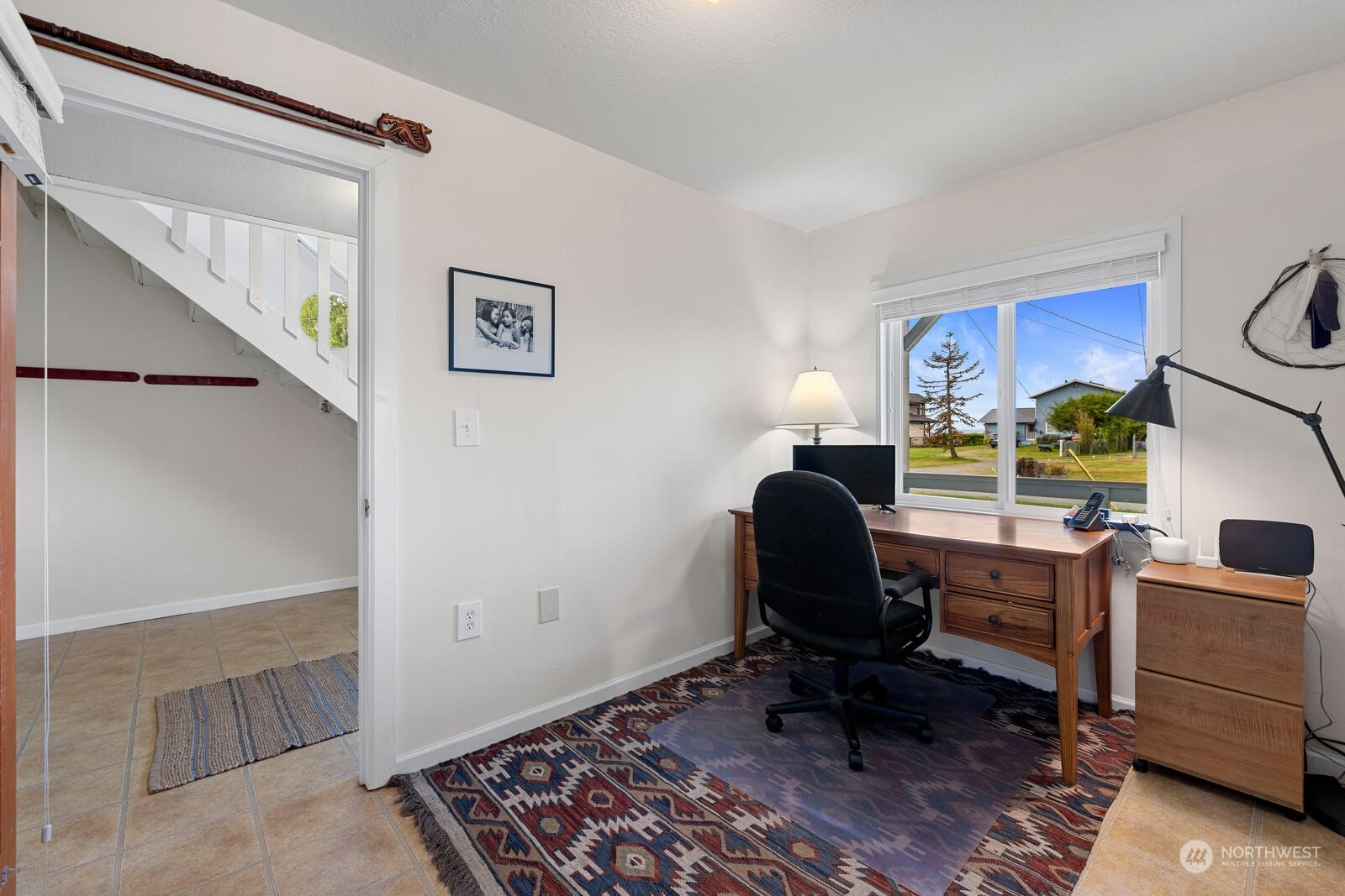 7524 Maxwelton Road Clinton, WA 98236 - Photo 21 of 30 a view of a workspace with furniture and a window