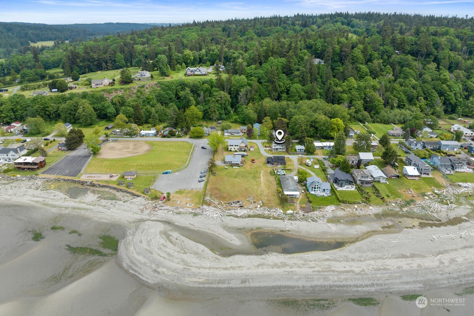 7524 Maxwelton Road Clinton, WA 98236 - Photo 28 of 30 a view of a swimming pool with a yard