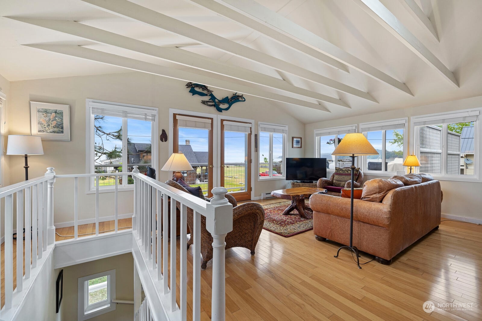 7524 Maxwelton Road Clinton, WA 98236 - Photo 7 of 30 a living room with furniture and a large window