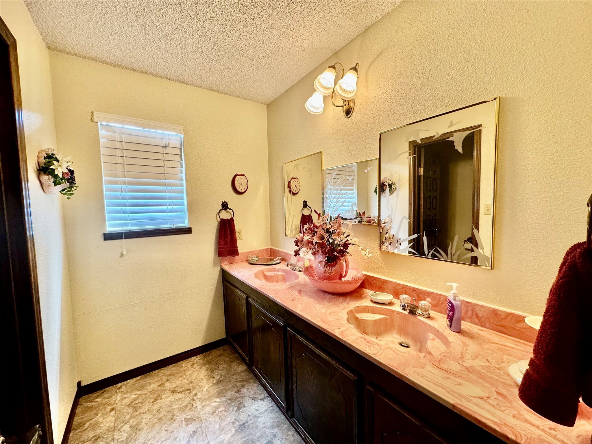 11586 Midway Road Cleveland, TX 77328 - Photo 14 of 37 a bathroom with a sink double vanity and a mirror