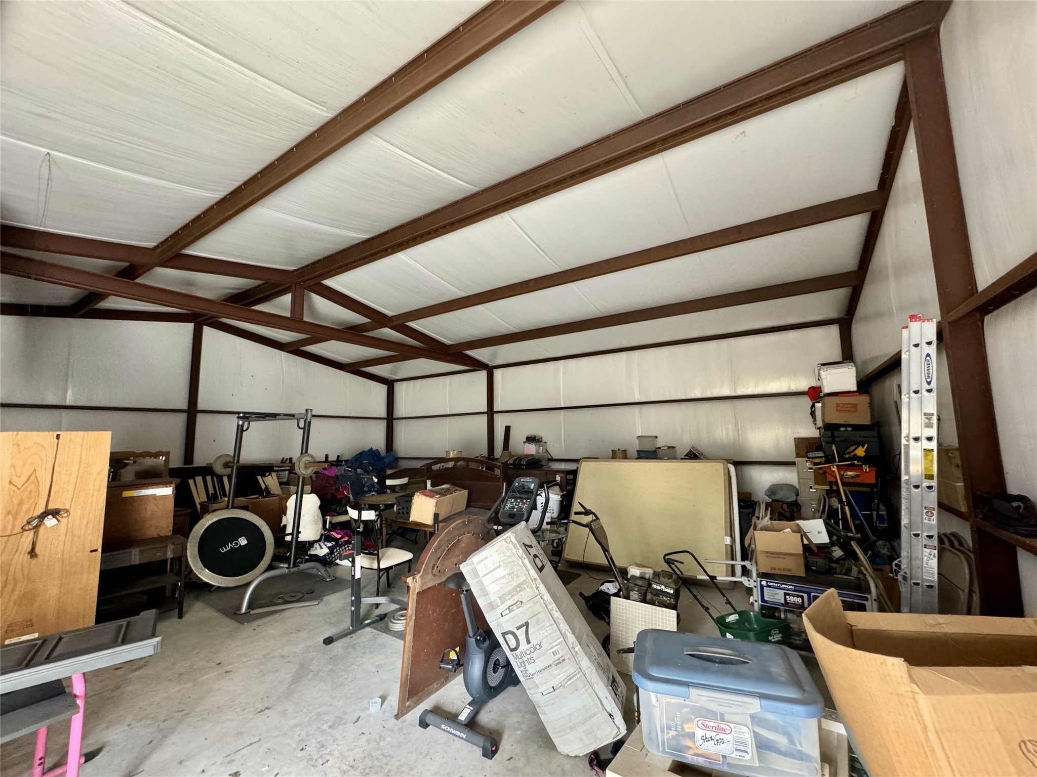 11586 Midway Road Cleveland, TX 77328 - Photo 17 of 37 a view of storage and utility room