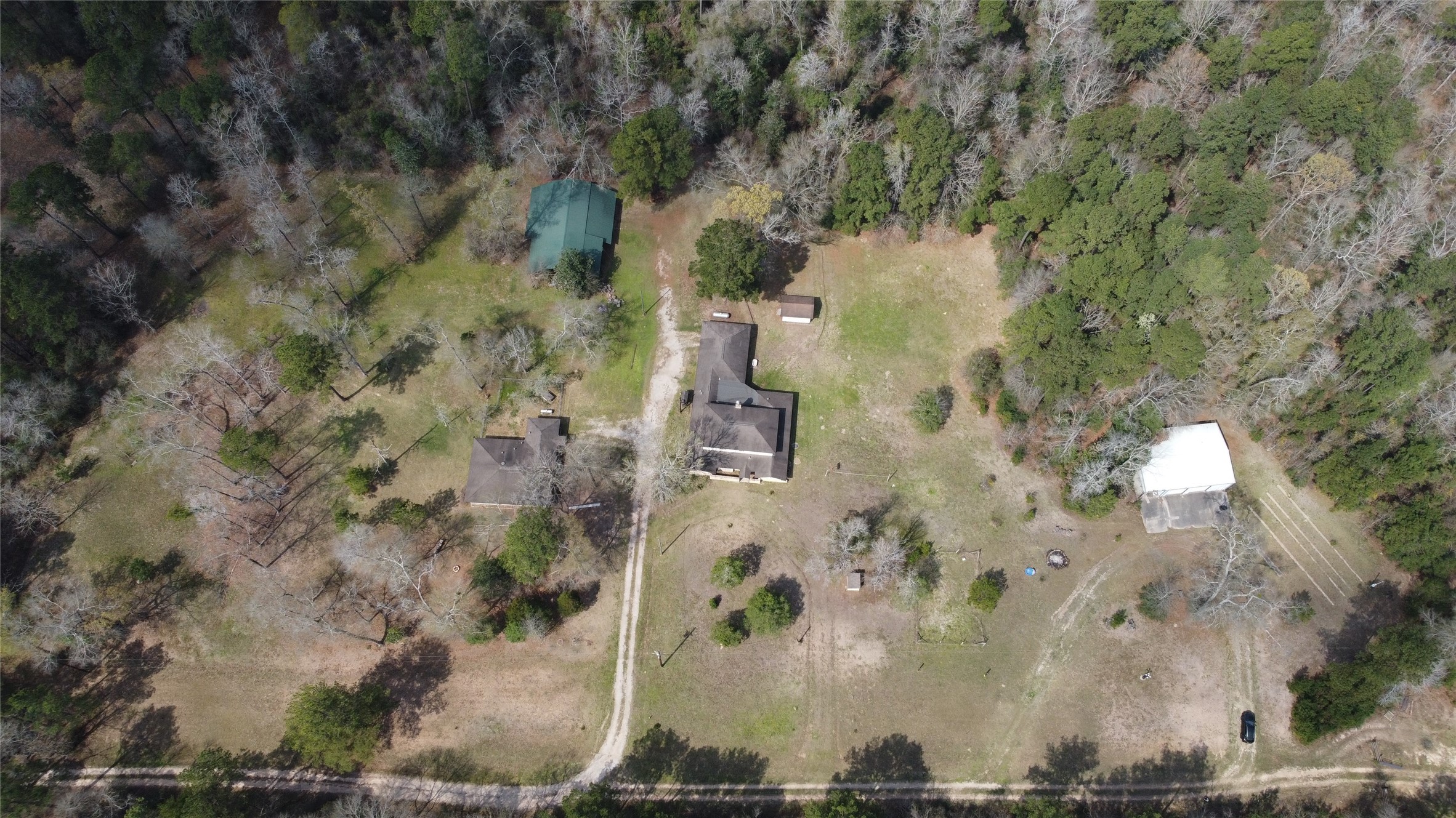 11586 Midway Road Cleveland, TX 77328 - Photo 32 of 37 an aerial view of residential houses with outdoor space