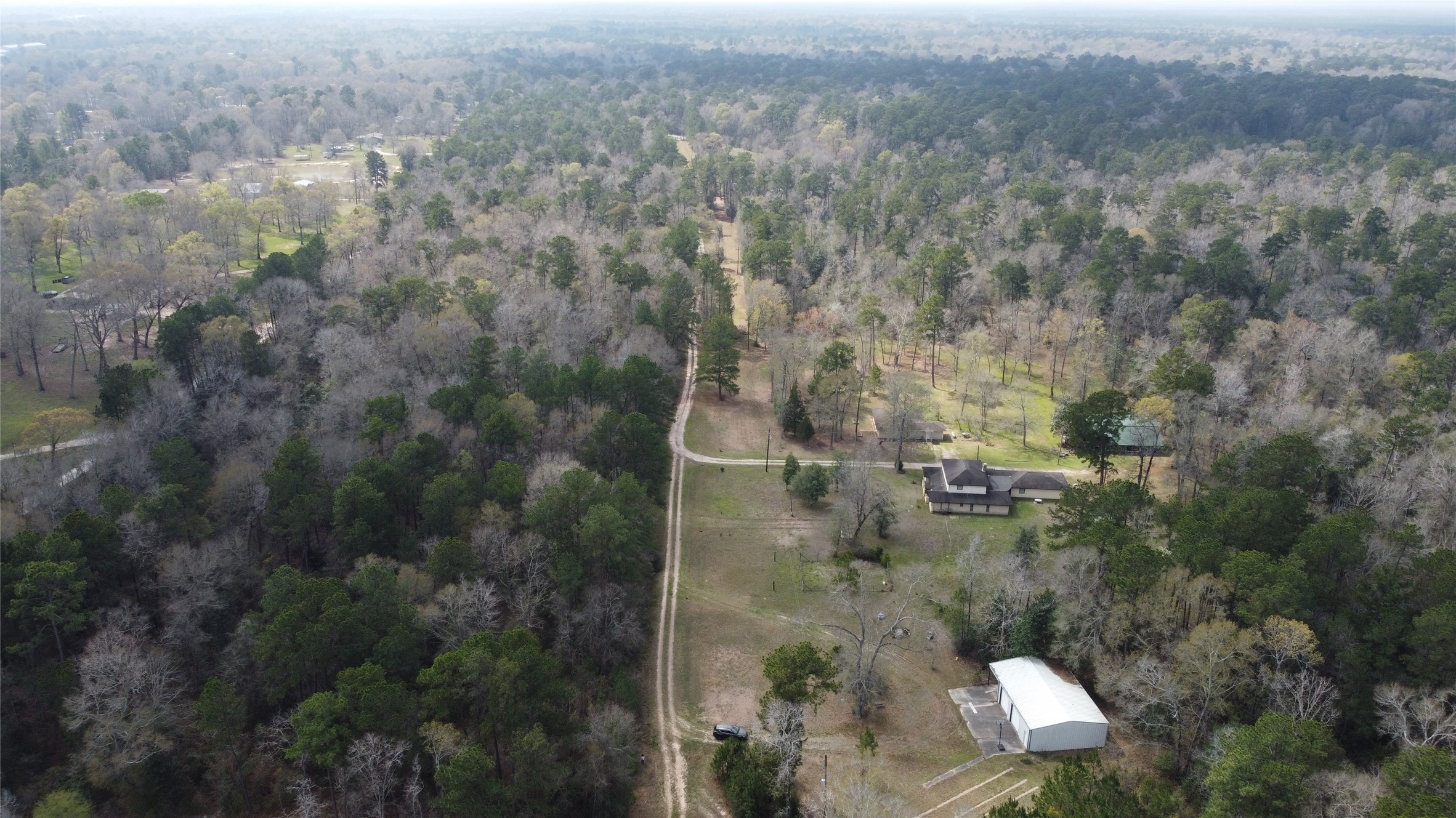 11586 Midway Road Cleveland, TX 77328 - Photo 35 of 37 an aerial view of residential house with outdoor space