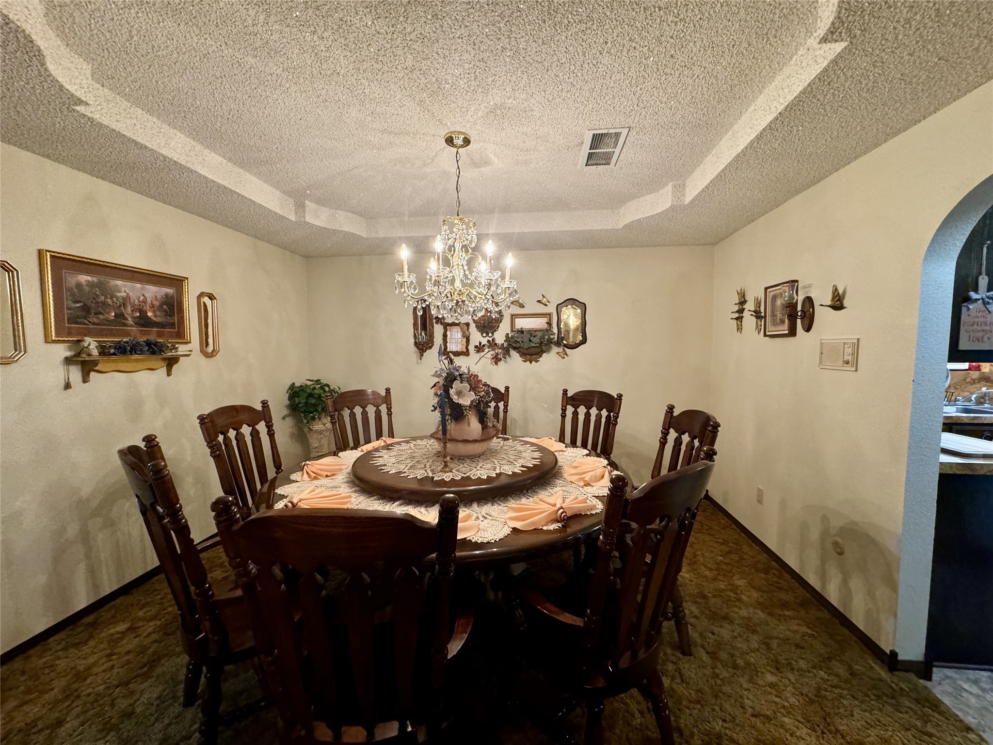 11586 Midway Road Cleveland, TX 77328 - Photo 4 of 37 a dining room with furniture a chandelier and window