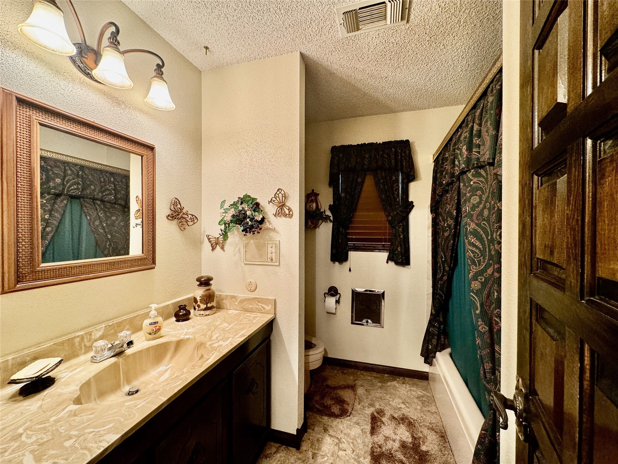 11586 Midway Road Cleveland, TX 77328 - Photo 10 of 37 a bathroom with a double vanity sink a mirror and shower